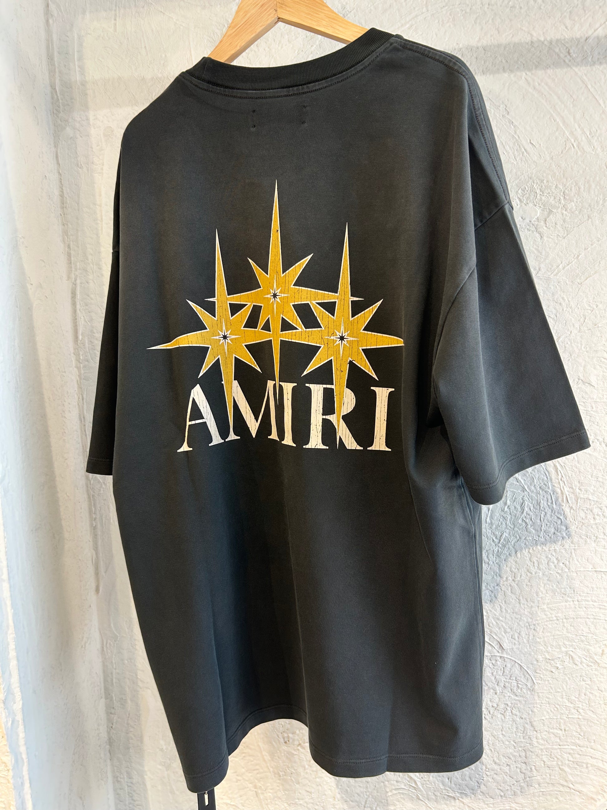 【AMIRI】スターバースト Tシャツ AMIRI Starburst Tシャツ | ブラック | FARFETCH JP